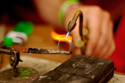 Jeweler working at her workshop