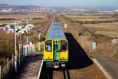 Train leaving bishopstone station. southern railway from seaford to brighton. uk.