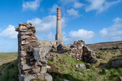 Landscape photo of an abandoned building from the mining industry on the cornish caost