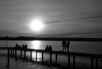 Silhouette of pier at sunset