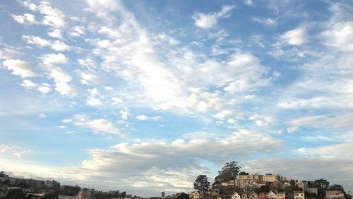 Low angle view of city against sky