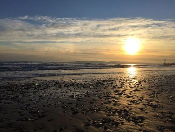 Scenic view of sea at sunset