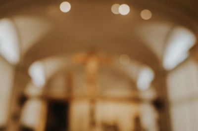 Low angle view of illuminated lights in building