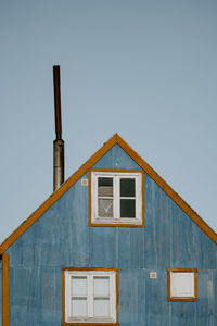 Low angle view of house against clear sky