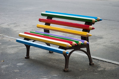 Bench made with colored pencils on footpath