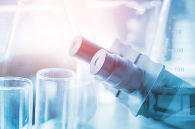 Double exposure of laboratory equipment on table