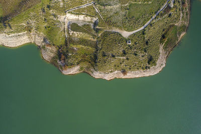 Aerial view of seascape by land