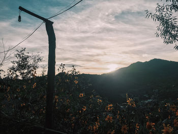 Scenic view of mountains against sky during sunset
