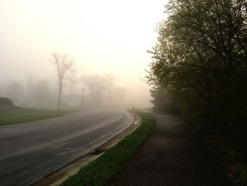 Empty road in foggy weather