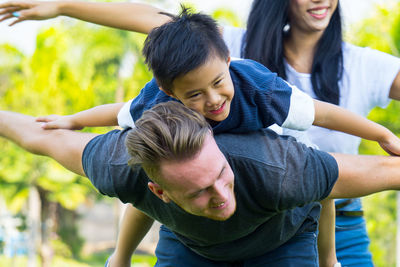 Happy family enjoying at park