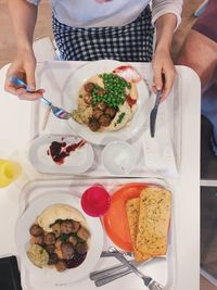 High angle view of people eating food