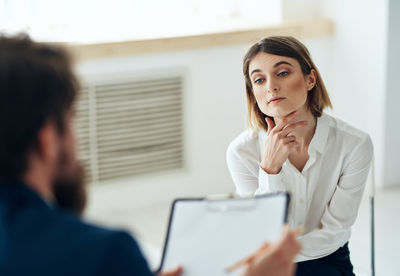 Portrait of businesswoman working at office