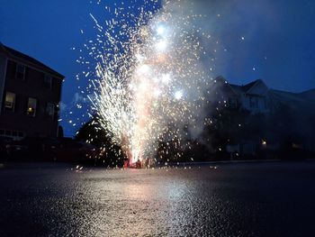 Firework display at night