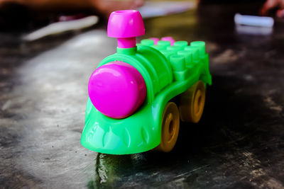 Close-up of multi colored toy in container