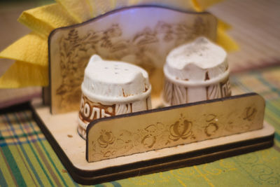 Close-up of coffee cup on table