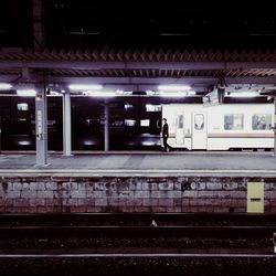 People on railroad station platform