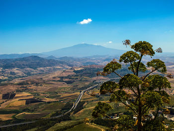 Scenic view of tree mountains against sky