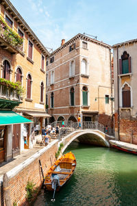 Arch bridge over canal in city