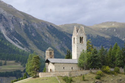 Built structure with mountain range in background