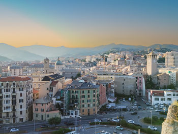 High angle view of townscape against sky during sunset