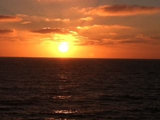 Scenic view of sea at sunset