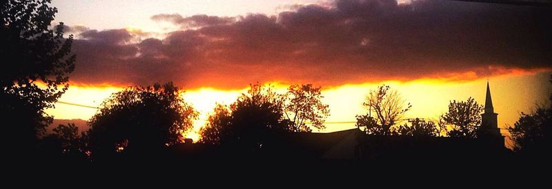 Scenic view of cloudy sky at sunset