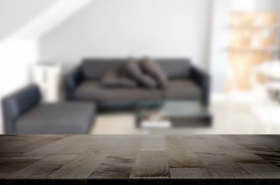 Close-up of sofa on table at home