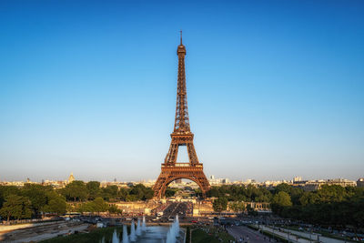 Eiffel tower at sunset from trocadero. famous tourist landmark in paris, france