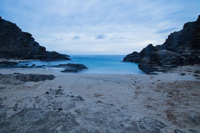 Scenic view of beach against sky