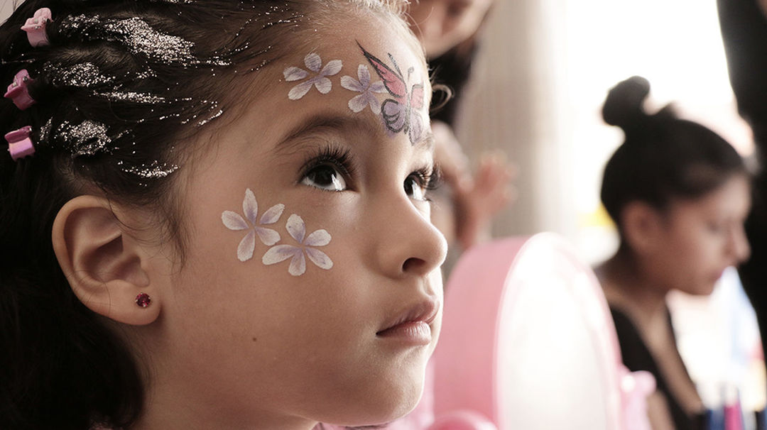 CLOSE-UP OF CHILDREN AT HOME