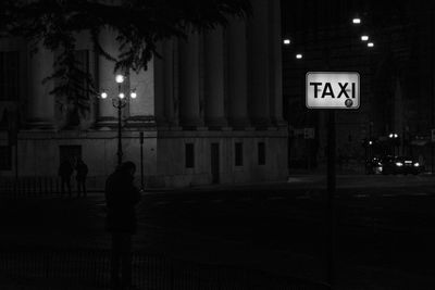 Illuminated street light at night