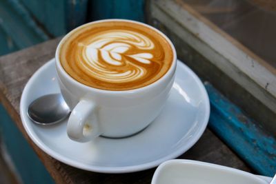 Close-up of cappuccino on table