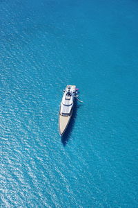 High angle view of sailboat sailing in sea