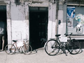 Bicycle parked outside building