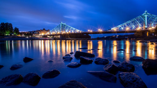 View of illuminated city at waterfront