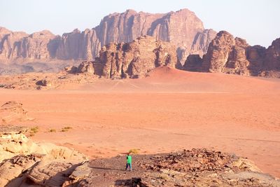 Scenic view of desert against clear sky