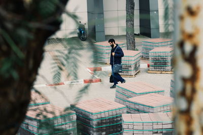 People walking on staircase in city