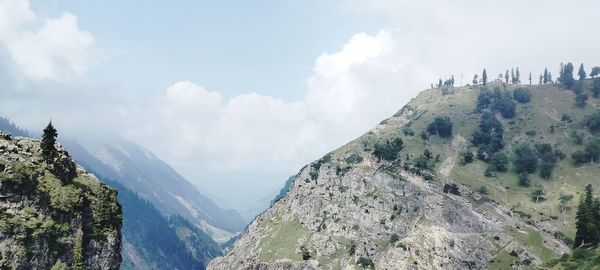 Panoramic view of rocky mountains against sky