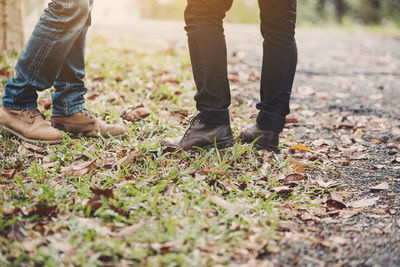 Low section of people standing on ground