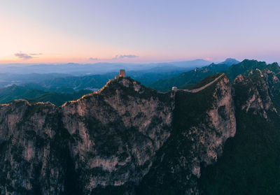 Scenic view of mountain against sky during sunset