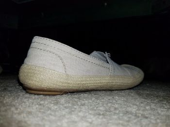 Close-up of shoes on table