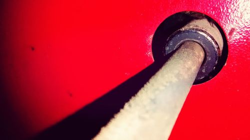 Close-up of red object on wall