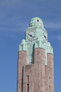 Low angle view of building against blue sky