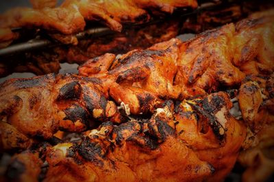 Close-up of meat on barbecue grill