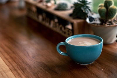 Close-up of coffee cup on table