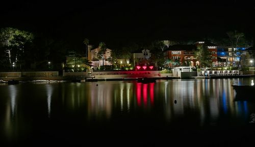 Reflection of illuminated buildings in water
