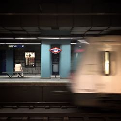 Blurred image of train moving on station