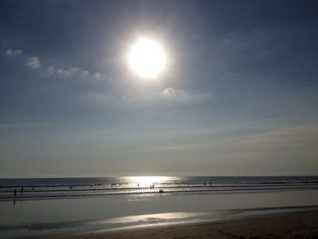 Scenic view of sea against sky at sunset