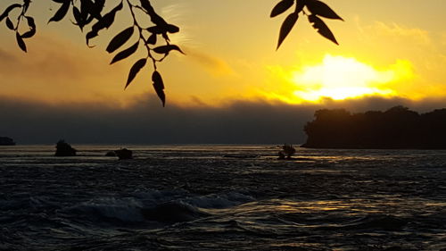 View of calm sea at sunset