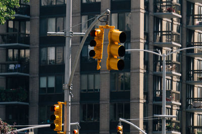 View of road signal against buildings